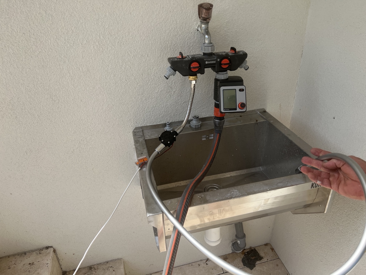 Water turbine connected to the tap-water setup